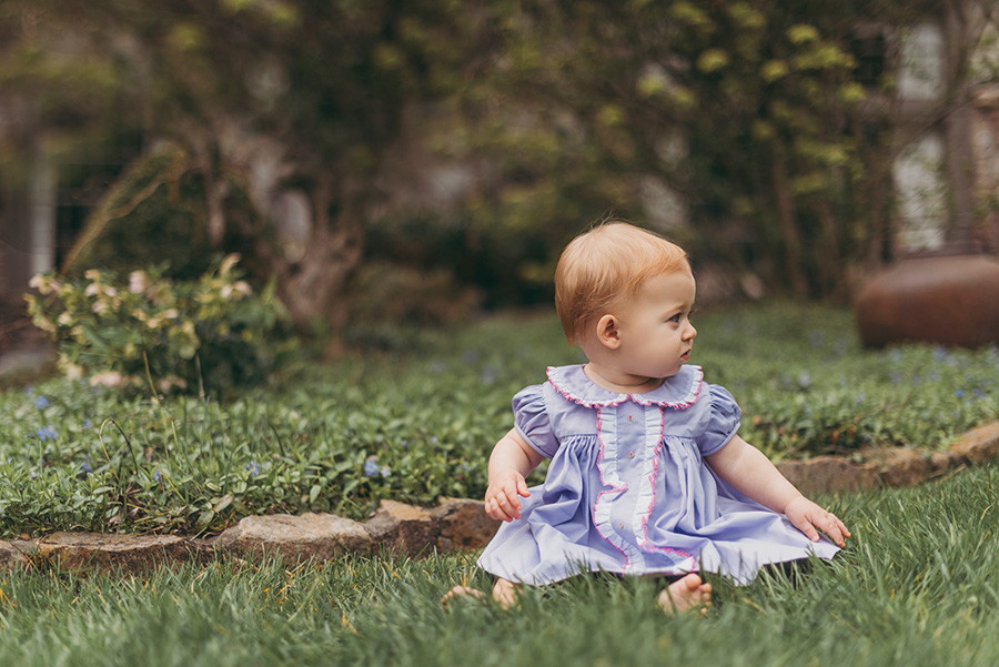 child in purple dress